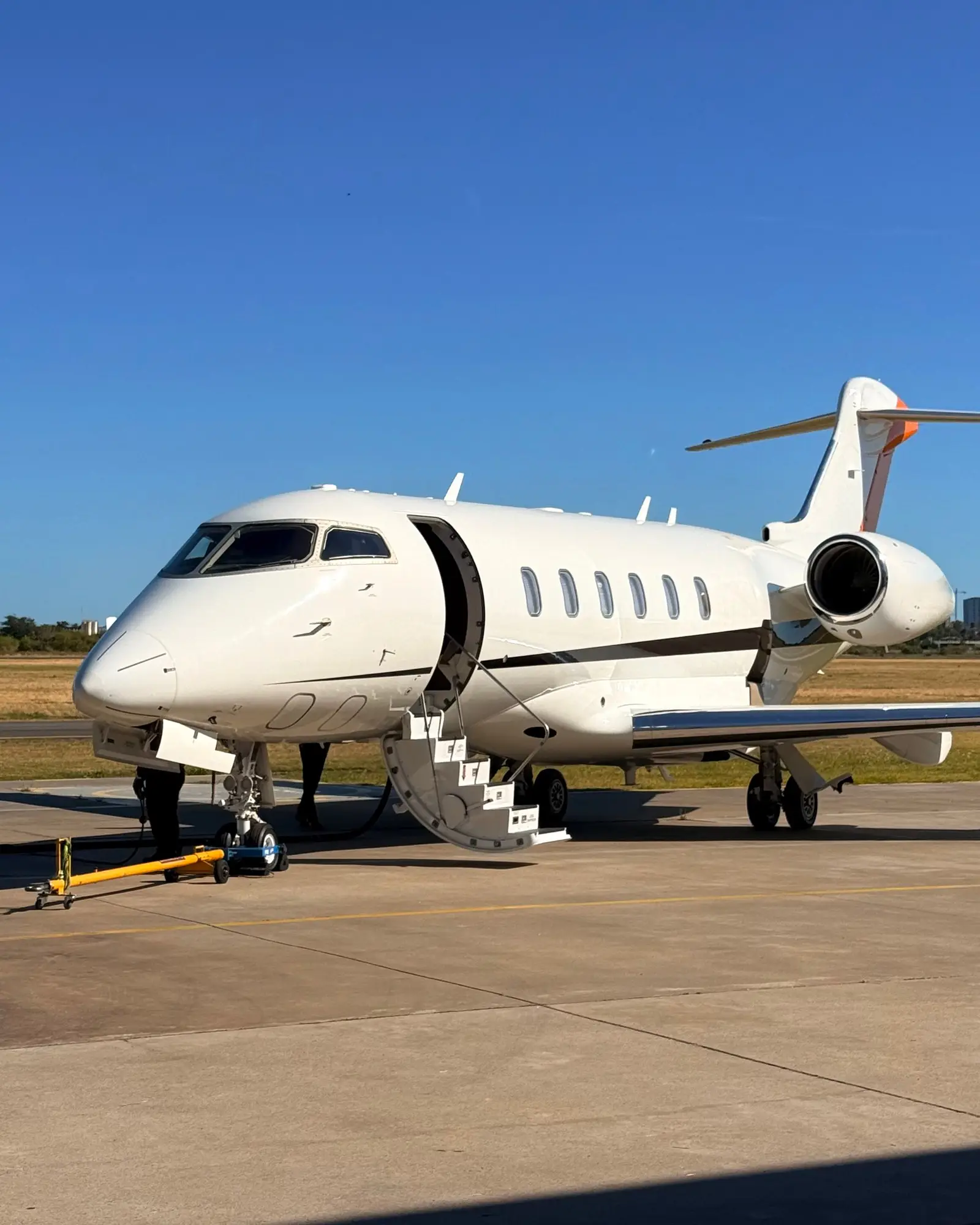 Business jet with its airstair down on the San Fernando apron