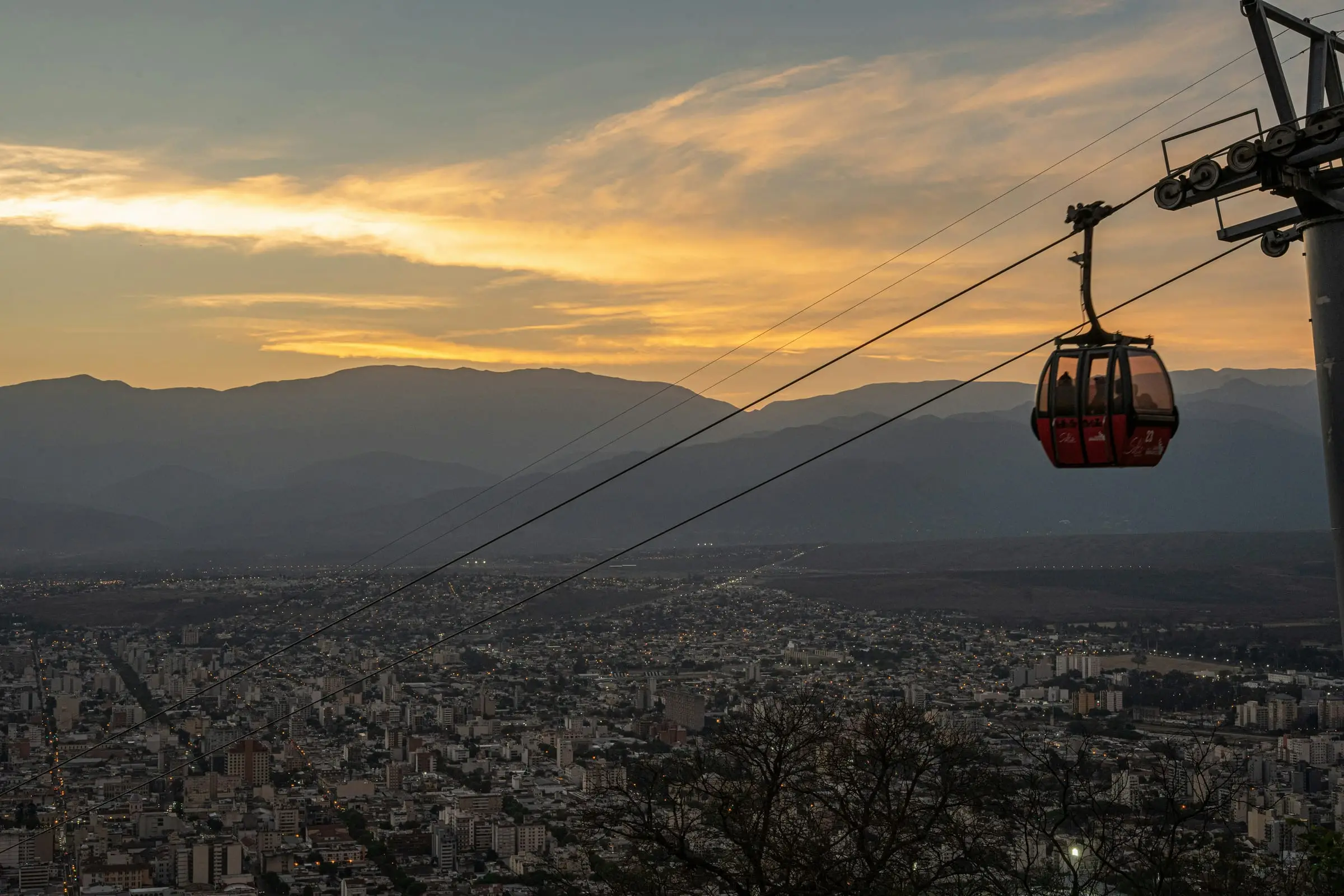 Salta city and hills at sunset with cable car