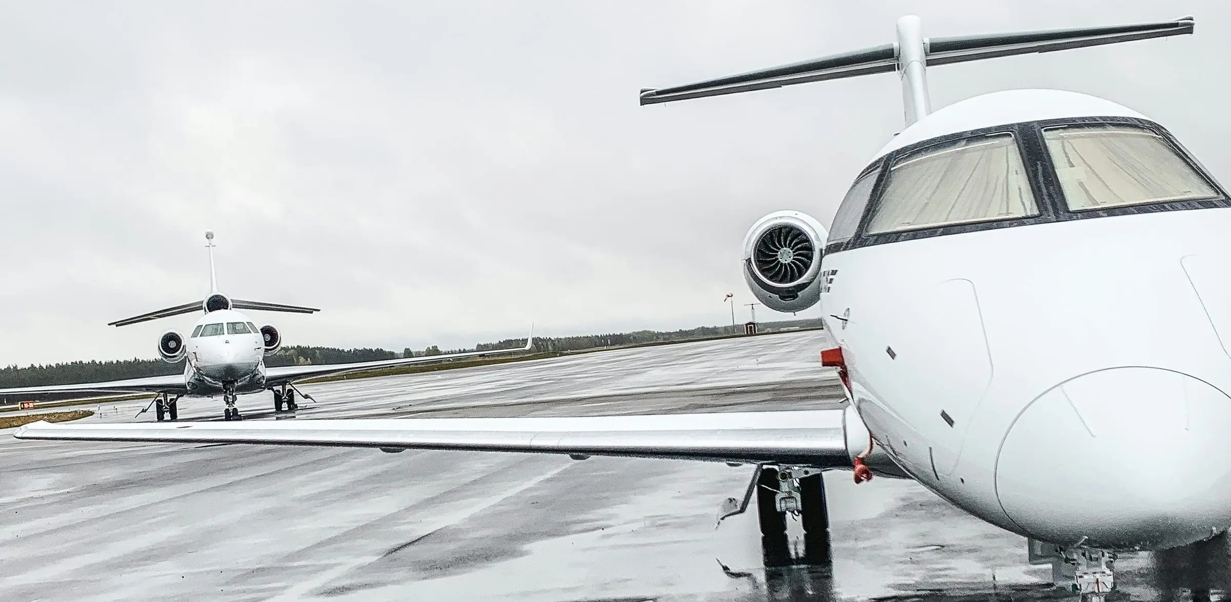 Two private jets on airport apron